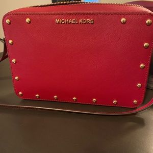 Red Canvas Michael Kors Crossbody purse. Only used once. Like brand new!
